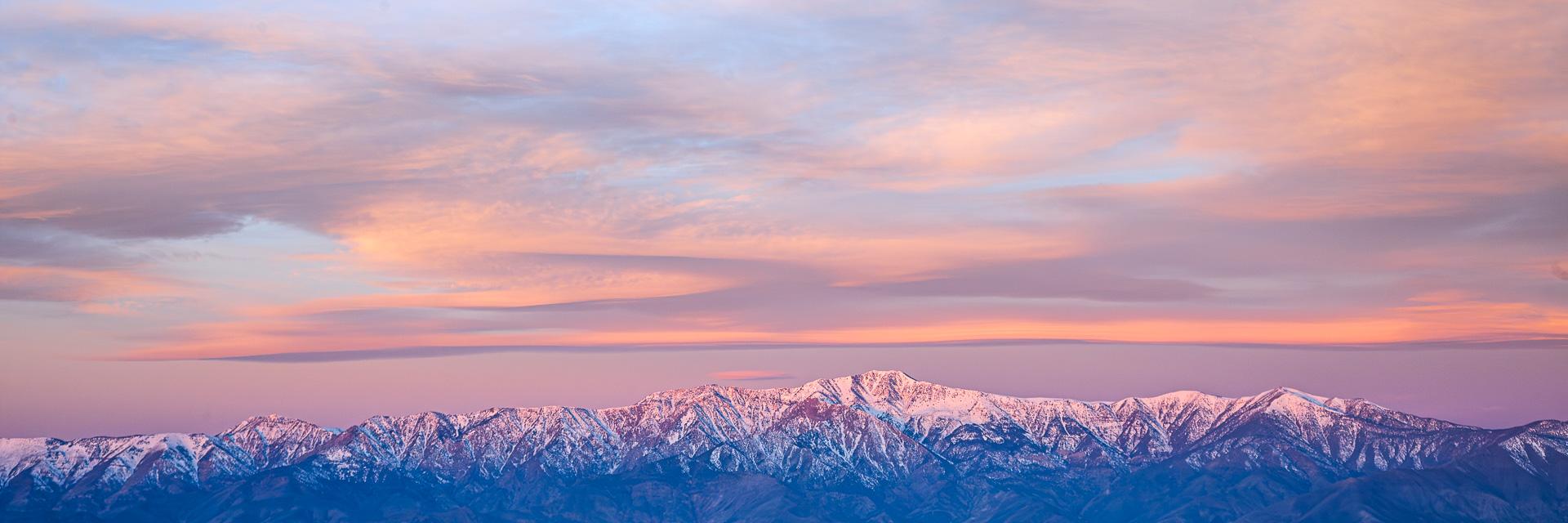 Mountain landscape at sunset — the kind of moment that feels impossible to capture